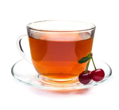 Cherry and transparent cup of tea Stock Photos