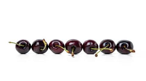 Cherry arranged in a row Stock Photos