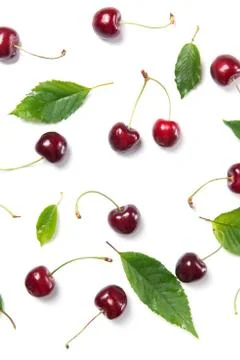 Cherry berries and leaves pattern isolated on white background, top view Stock Photos