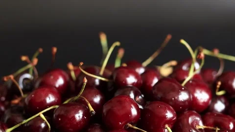 Cherry berries on a black background, close-up Stock Footage 278800222