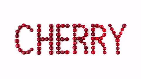 Cherry berries on white background. Fruit font, letters. 4K stop motion Stock Footage 80258499