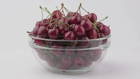 Cherry berries on a white background rotates Stock Footage 134452466
