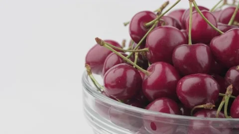 Cherry berries on a white background rotates Stock Footage 138014965