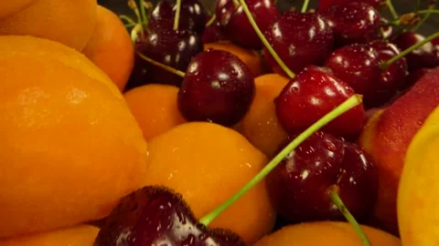 Cherry berry nectarines peashes exotic fruits Stock Footage 156842245