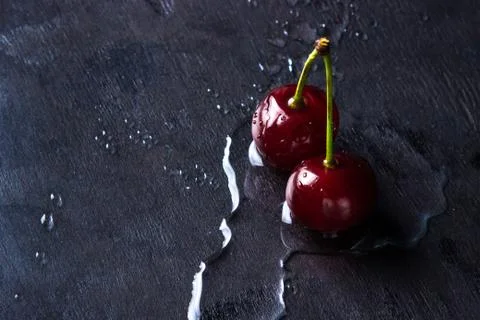 Cherry on a black background.  Stock Photos