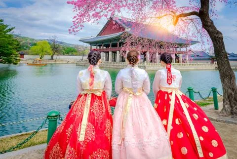 Cherry Blossom with Korean national dress at Gyeongbokgung Palacel,South korea. Stock Photos