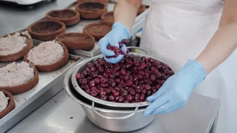 Cherry Cake Assembly With Fresh Cherry Filling. Confectionery production Stock Footage 321811787
