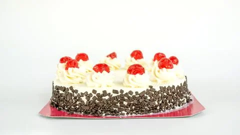 Cherry cake on a white background. Stock Photos