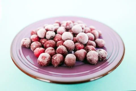 Cherry in the ceramic bowl Stock Photos