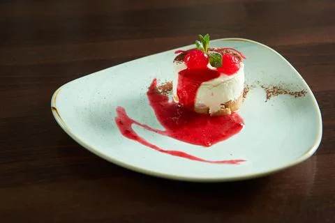Cherry cheesecake served at the cafe Stock Photos