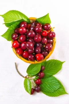 Cherry, Cherry in a clay plate on the table Stock-Fotos