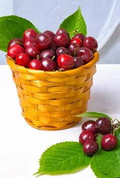 Cherry, Cherry in a clay plate on the table Stock Photos