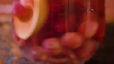 Cherry compote in a jug Stock Footage 253717505