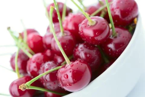 Cherry is in a cup Stock Photos