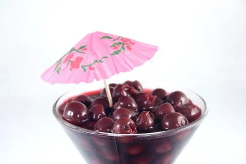 Cherry in cup Stock Photos