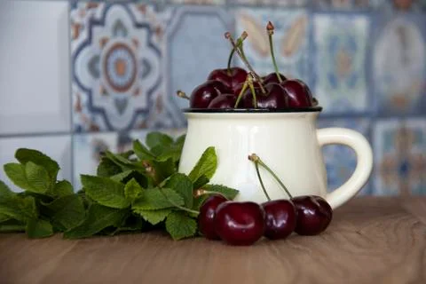 Cherry in cup Stock Photos
