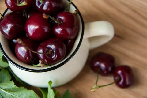 Cherry in cup Stock Photos