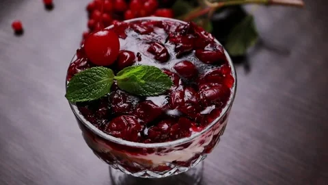 Cherry dessert in a glass close-up Stock Footage 328187995