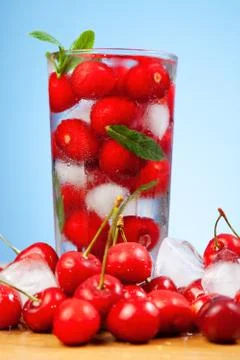 Cherry drink with ice Stock Photos