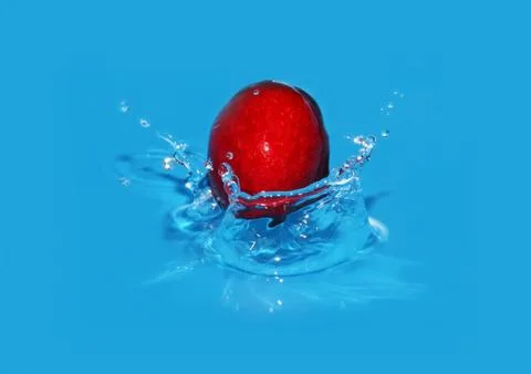 Cherry falls in  water Stock Photos