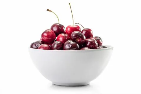 Cherry fruit in white dish Stock Photos