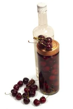 Cherry fruit worked and put in alcohol Stock Photos