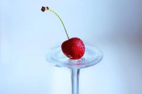 Cherry on a glass Stock Photos