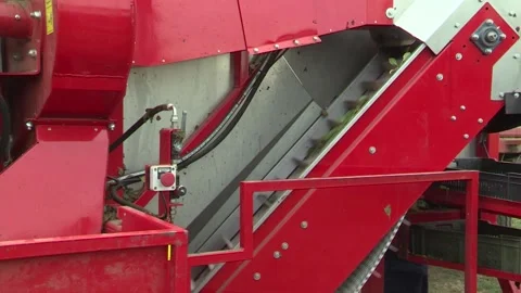 A cherry harvester's shaking system Stock Footage 302457183
