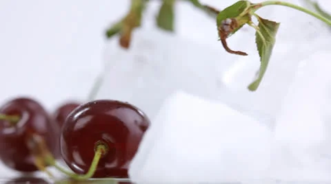 Cherry with ice cubes closeup Stock Footage 27185346