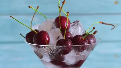 Cherry on ice with water drops Video stock 157210677