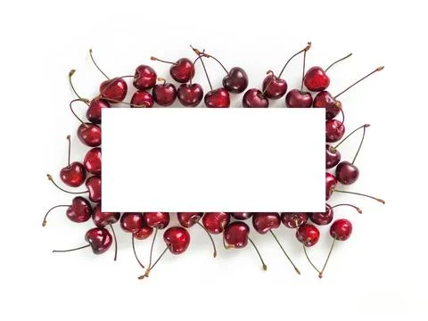 Cherry isolated on white with white rectangle Creative layout with fresh r... Stock Photos