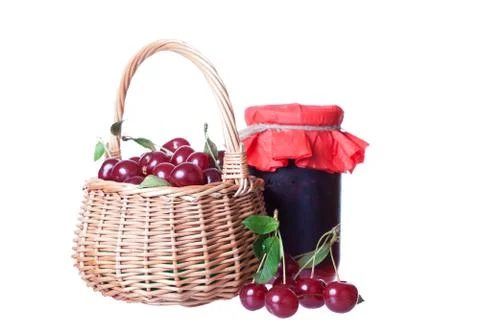 Cherry jam glass jar reflected on white background Fotos Stock
