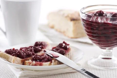 Cherry jam on toast Stock Photos