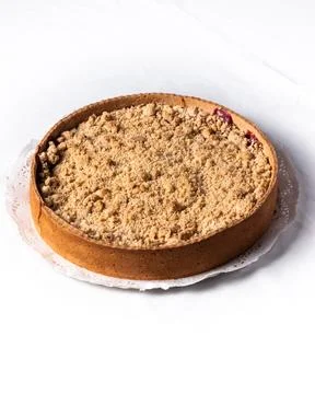Cherry kuchen on a table with a white tablecloth Stock Photos