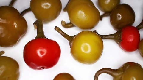 Cherry peppers on rotating plate seamless looping hd background cover video Stock Footage 107616933