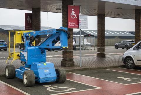 Cherry picker in disabled parking bay Stock Photos