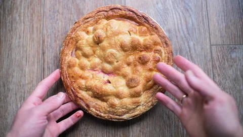 Cherry pie container sweet dessert food hand holding macro closeup Stock Footage 330295532