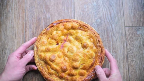 Cherry pie container sweet dessert food hand holding macro closeup 스톡 동영상 330296216