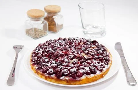 Cherry pie with fork and knife Stock Photos