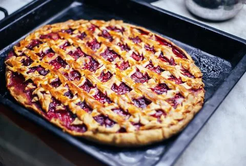 Cherry pie at home close up Stock Photos