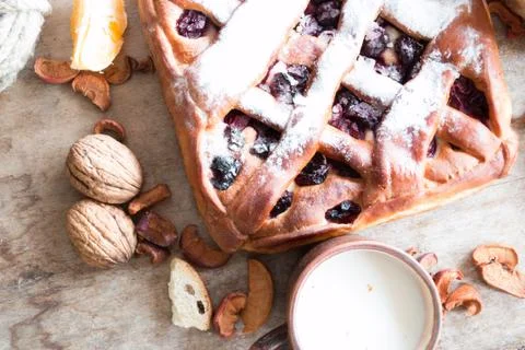 Cherry pie on the kitchen table Stock Photos