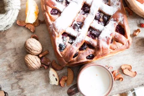 Cherry pie on the kitchen table Stock Photos