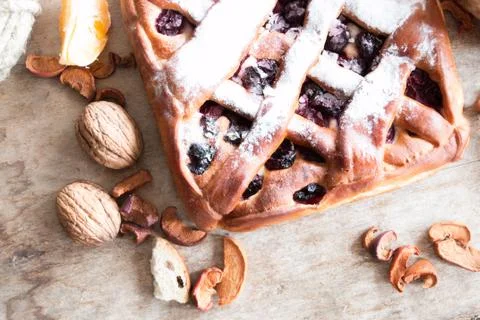 Cherry pie on the kitchen table Stock Photos