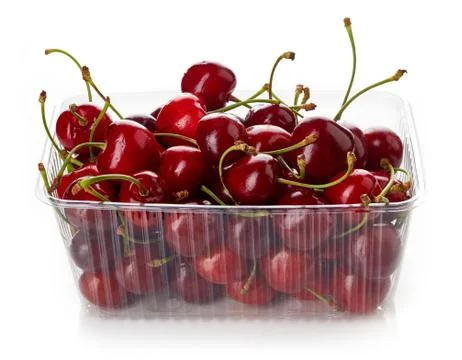 Cherry in plastic container box isolated on white Stock Photos