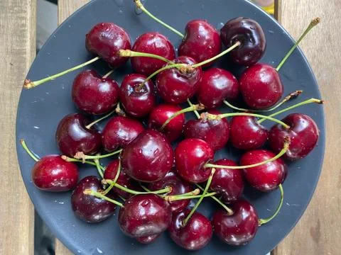 Cherry in plate, closeup Foto stock