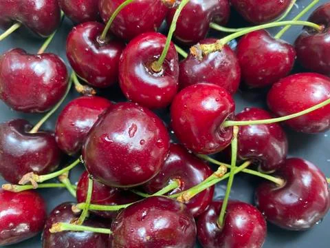 Cherry in plate, closeup Stock Photos