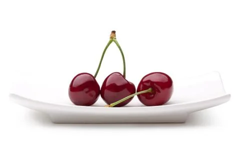 Cherry on a plate Stock Photos