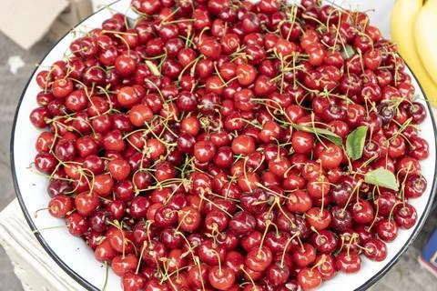 A cherry in a plate Fotos Stock