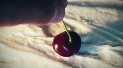 Cherry put in cream Stock Footage 39969435