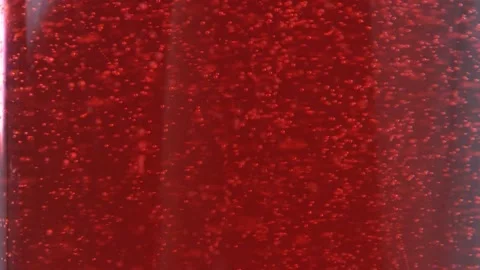 A cherry in red soda drink Stock Footage 138367587